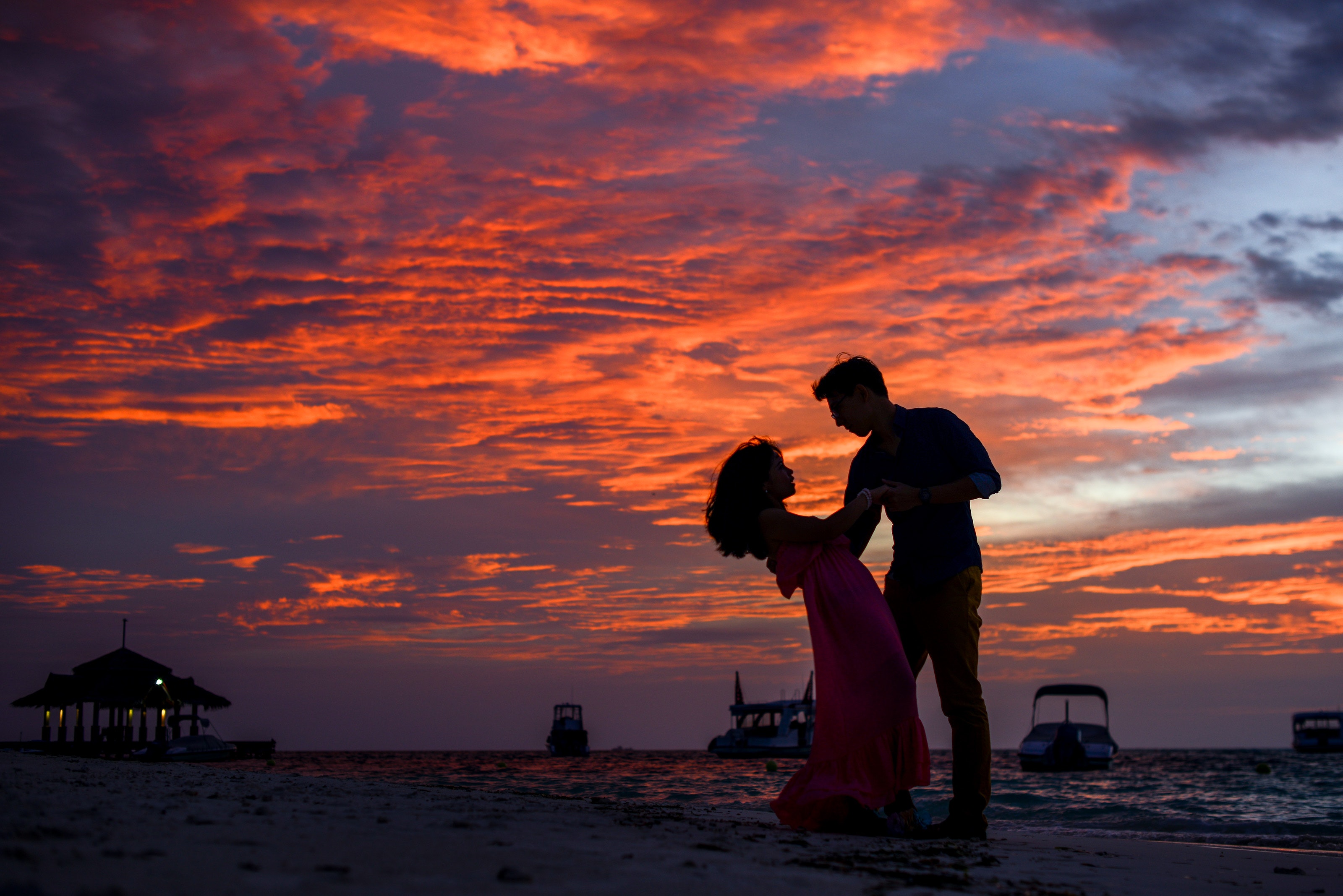 man-and-woman-on-beach-during-sunset-1024963.jpg